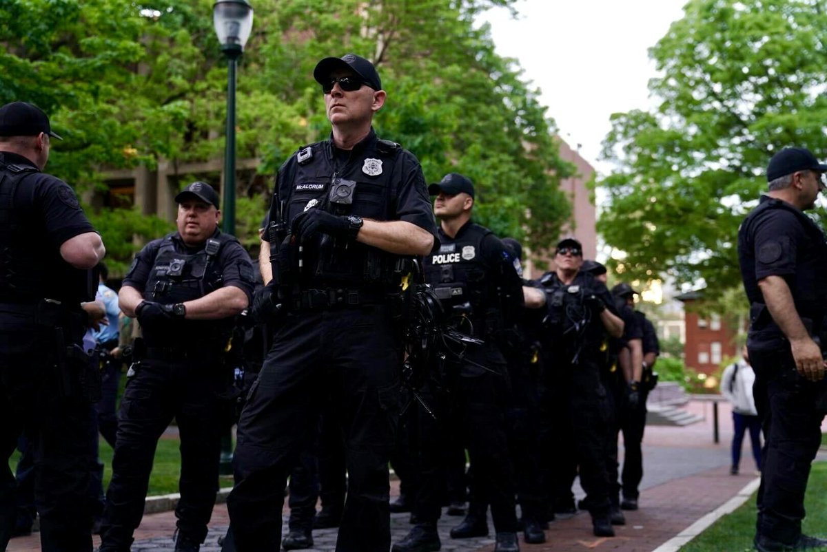 At least 40 police officers have surrounded the ongoing rally. Philadelphia Police Department members, some of whom carry zip tie handcuffs and wear badges identifying them as members of the “Major Incident Response Team” and “Counterterrorism Unit,” are east of the encampment.