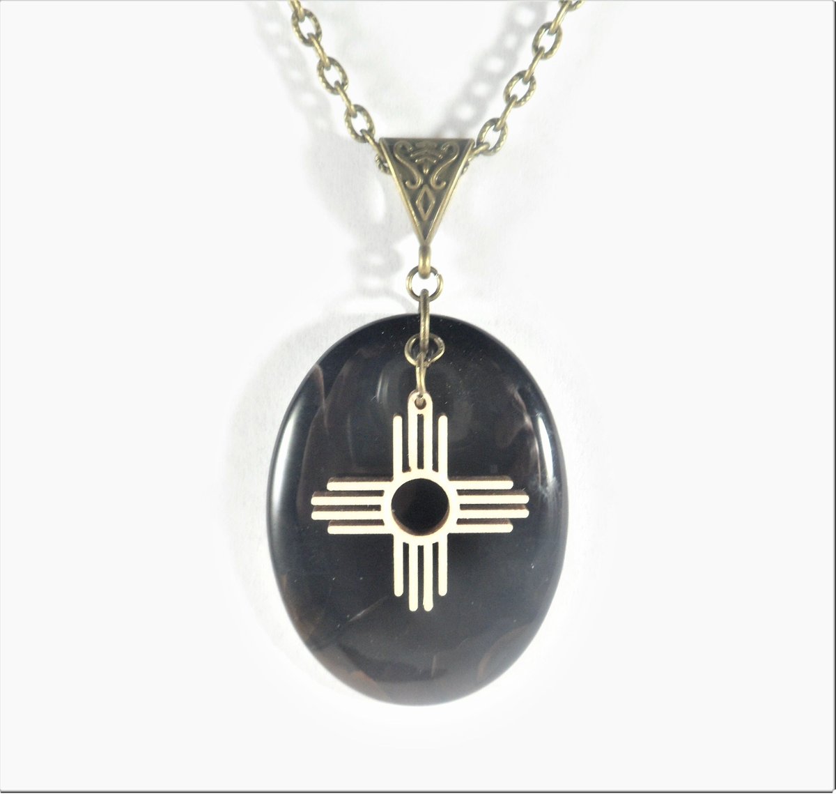 Zia Pendant, Bronze Zia Necklace, Unisex Santa Fe New Mexico Zia Symbol Jewelry, Unique Wood Zia Charm Pendant, Dark Brown Agate Zia Jewelry tuppu.net/f34f12e2 #EtsySeller #NewMexico #SantaFe #EtsyShop #UniqueZiaPendant