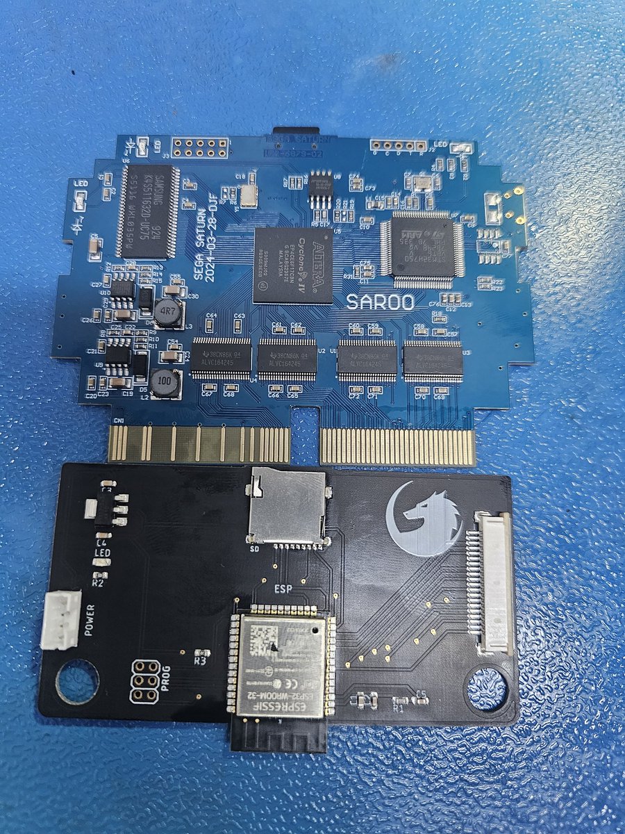 Voultar's tweet photo. I've been playing with my Saroo Saturn cartridge for the past few days, and I'm extremely happy with it! A lot of you are asking me if I would recommend Saroo over the Fenrir ODE, and here is my answer.

COST:
I purchased the Saroo that included a 64GB SD card for $74. The Fenrir by itself costs $140 from SaG with no SD card.

FEATURES:
The Saroo does several things! Obviously, it loads Saturn games, but it also has modchip functionality for burned, or out-of-region titles as the CD-ROM is left intact. The Fenrir replaces the ODE all together and simply acts as a drive replacement. The Saroo is equipped with a Cyclone IV, which is pretty powerful! Load times are virtually non-existent compared to the CD-ROM/Fenrir, and I imagine that additional functionality can leverage the horsepower of the FPGA on board. It also has several awesome developer options!

COMPATIBILITY:
Currently, Saroo is compatible with ~95% of the Saturn library, with that number increasing as development continues. Saroo is an open-source flash cart with many brilliant people from the Saturn Dev community contributing. The Fenrir currently has nearly perfect compatability and is closed source. 

IMHO, the Saroo is too interesting to pass up. It's the real deal, and the fact that the optical drive is left intact means that it gets my vote.  

MANY people ask me about the Satiator and what my thoughts are.. I've said this before and I'll say it again.. The creator of the Satiator held a several year long Patreon  where he solicted money to JUST TO DEVELOP the thing. He then followed that up by offering those people (some of whom donated thousands) a few dollars off a retail unit. I ethically can't align with him or his conduct, and therefore, I will never use his product.

Just my $0.02!