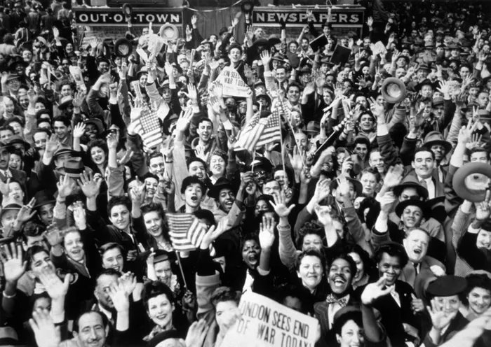 Today in history, 1945: German troops lay down their arms and the war in Europe is over. People throughout Europe, the Soviet Union, the U.S., Canada and Australia put out flags and banners and crowded the streets to celebrate the victory of the Allies. /1 #ResistanceRoots