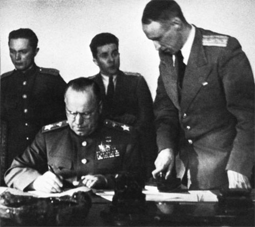 Georgi Zhukov signing the German surrender document, Karlshorst, Berlin, Germany, 8 May 1945
