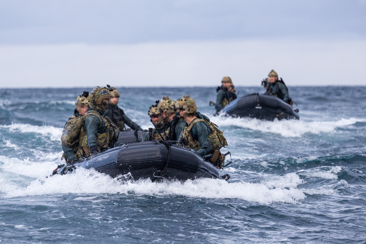 Members from Special Operations Command prepare their Zodiacs during Exercise Iron Atlantis.