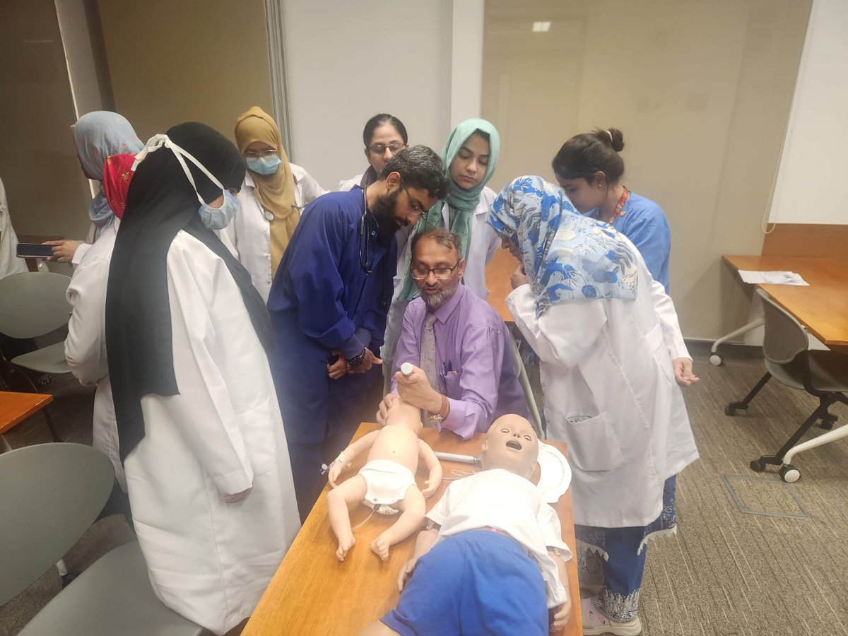 Neonatologist Dr Adnan Mirza gives NICU doctors a refresher on endotracheal intubation skills with chest tube insertion at @akucime. #ContinuingEducation
