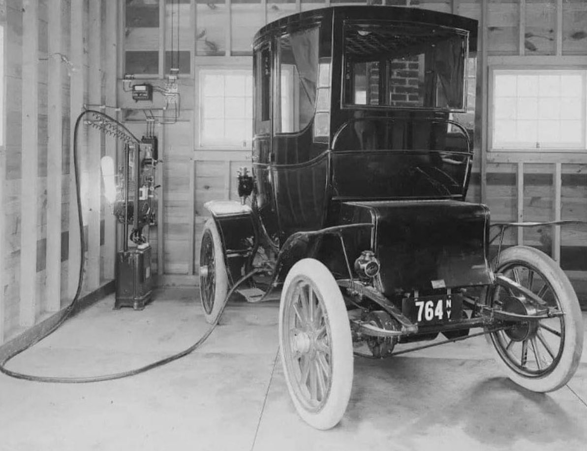 Charging an electric car in the garage, New York, 1911.