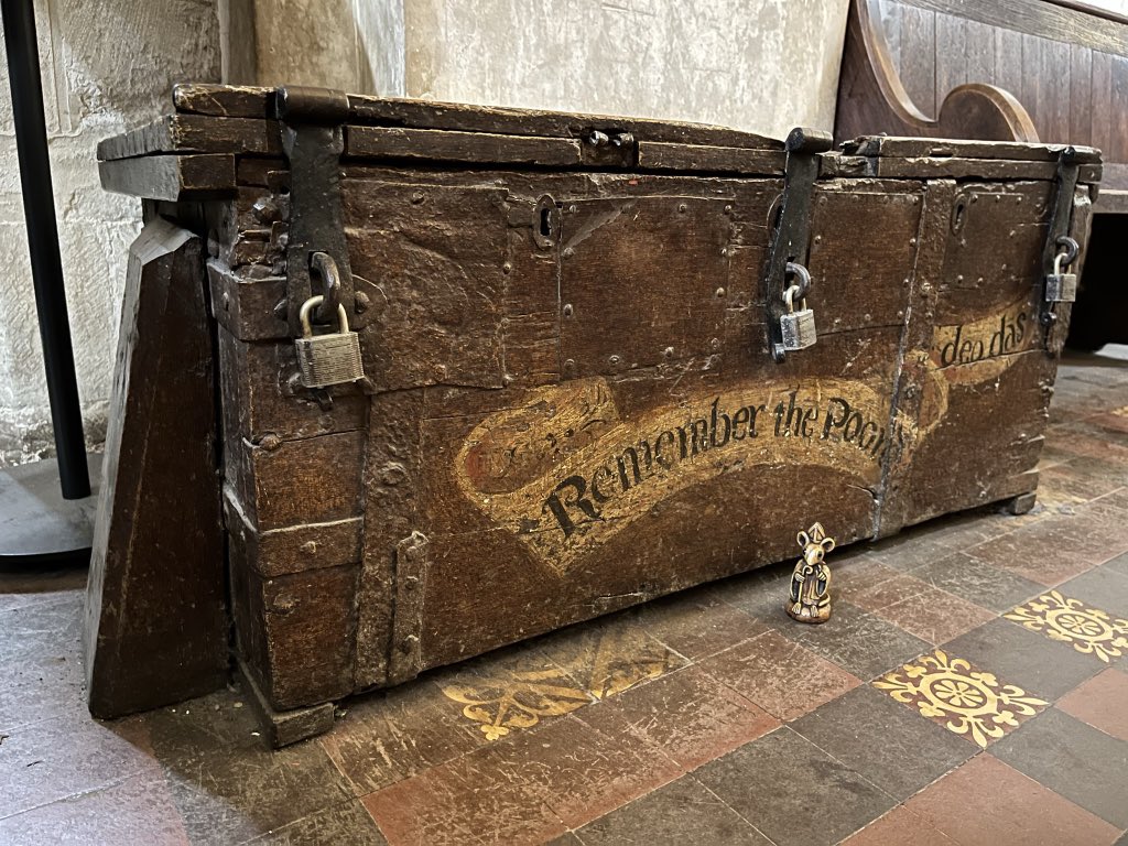 This parish poor box dates all the way back to the 1650s. There was a separate key for each lock, held by three different people as a way to prevent pilfering.