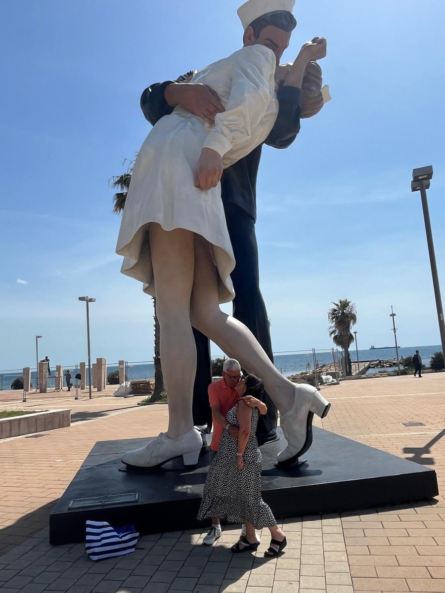 Johnson crafted the statue from bronze to resemble a seminal 1945 photograph that captured the spontaneous moment of a sailor and a nurse kissing while out celebrating at day. The Kissing Statue #Civitavecchia #Rome