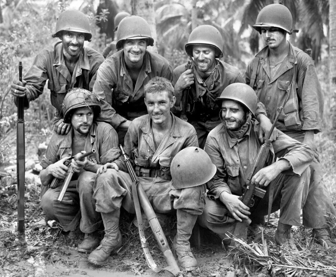 In August of 1944, Private William Wade of the 77th Infantry Division poses at center with his buddies after the battle for Barrigada on Guam. 🪖

Wade was lucky to survive when his helmet was penetrated by a Japanese sniper’s bullet. 🍀