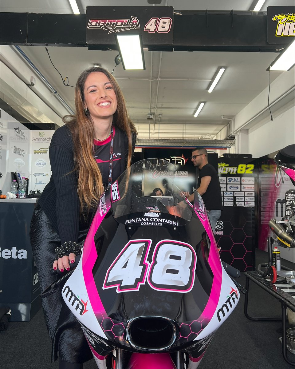 Meet Rebecca Sicali, Freelance @MotoGP Journalist and Press Officer for MTA Angeluss Moto3 Team 🏍️ From her young MotoGP blog to joining the paddock, Rebecca is now living her dream as a Motorsport Press Officer 💜 📸: @Angeluss_wsm #WomenInMotorsport #MotoGP