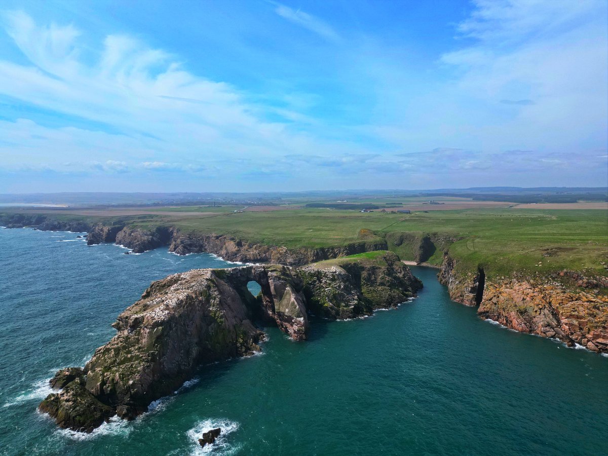 Dunbuy island / rock near Peterhead, north of Cruden Bay. Aberdeenshire coastline, Scotland.