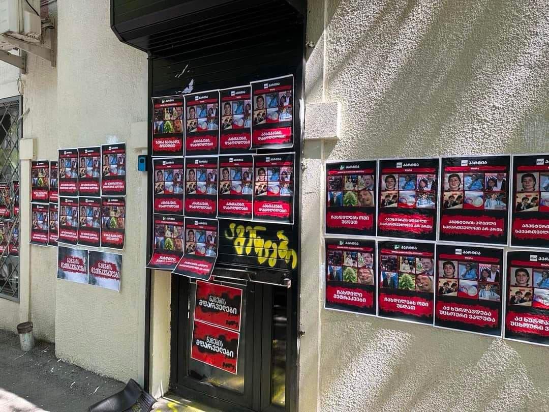 Reports flood social media: activists, journalists, opposition figures, and NGO reps opposing the 'foreign agents bill' receive threatening calls. Posters plastered with their faces brand them “traitors” and “enemies of the people”.