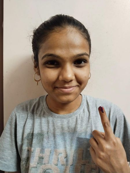 NSS volunteers of Shree M. R. Arts and Science College, Rajpipla captured a self selfie with voters as part of their initiative to promote voting awareness.
