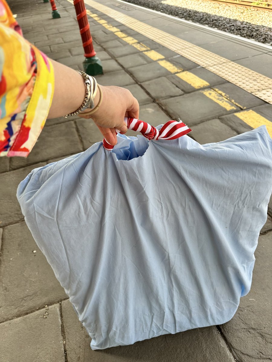 Waiting for a train to get to London to take painting to Royal Academy of Art for the next round of the summer exhibition. Yes, I am carrying it up in a sheet but have made a handle