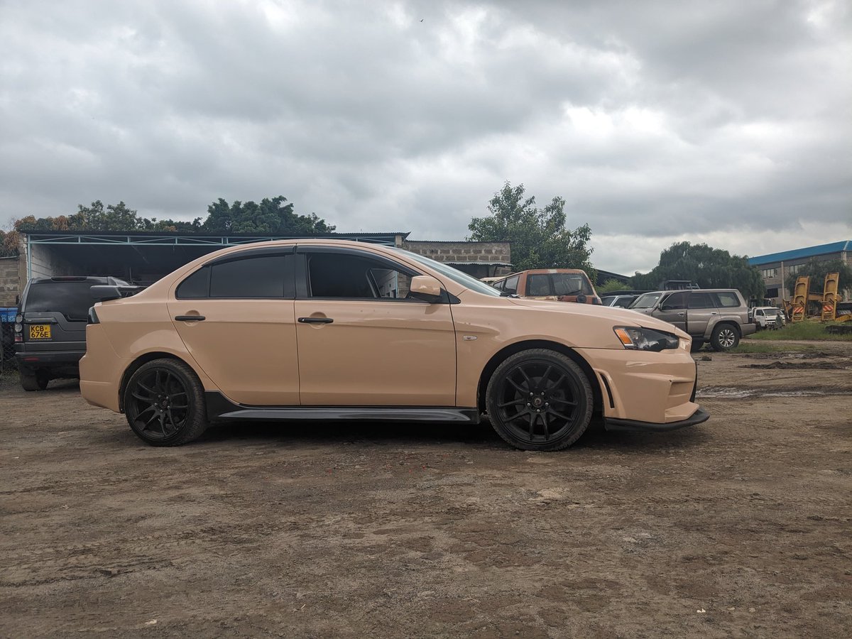 Mitusbishi Ralliart 
2012
4B11T
2000cc turbo petrol
Drivetrain - AWD
6 speed SST transmission 
Aftermarket front bumper 
VLAND taillights 
Wrapped beige. Black original color 
Aftermarket catback exhaust 
Aftermarket coilovers 

Asking 1.45m ONO
0701888990