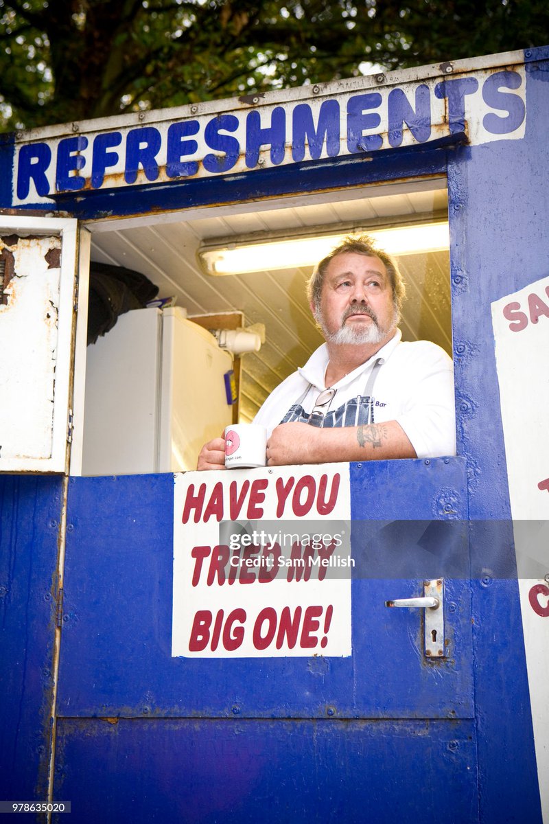A male cook waits for customers at a roadside burger van along the A140 in Norwich (2009)