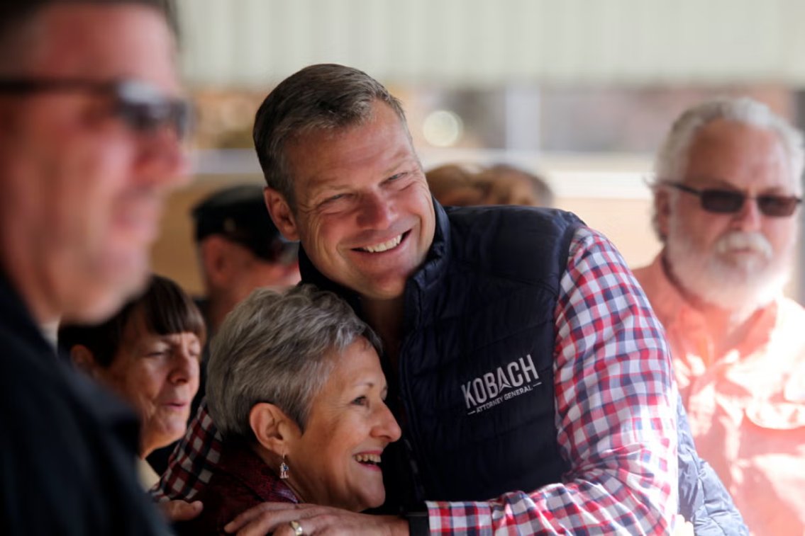 Kris Kobach, after electoral defeats in 2018 and 2020, competes closely with Democrat Chris Mann for Kansas Attorney General, aiming to prove his electability in a focused campaign. #KansasElection