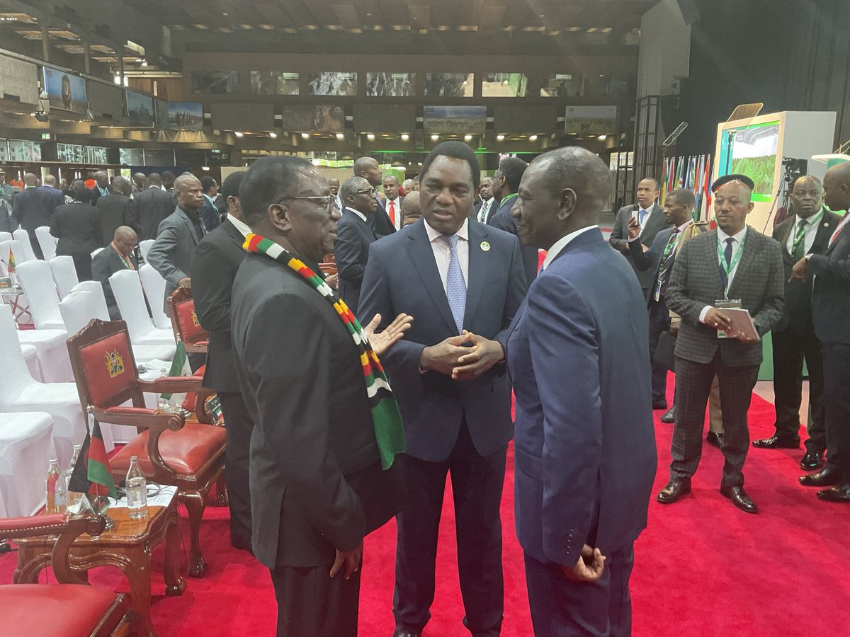 President Hakainde Hichilema of Zambia is pictured listening intently as President Emmerson Mnangagwa, who introduced the gold-backed currency in Zimbabwe, shares his insights on economic policy and currency reform.