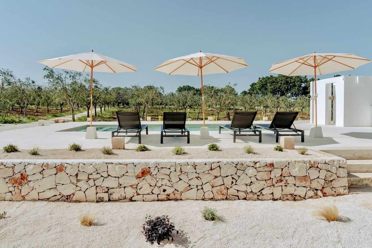 Perfection in Puglia. Surrounded by ancient olive groves and almond trees, the luxury property of Villa Guappi is a private hideaway, yet just a short drive from Puglia’s most famous spots of Ostuni, Alberobello and Polignano a Mare.