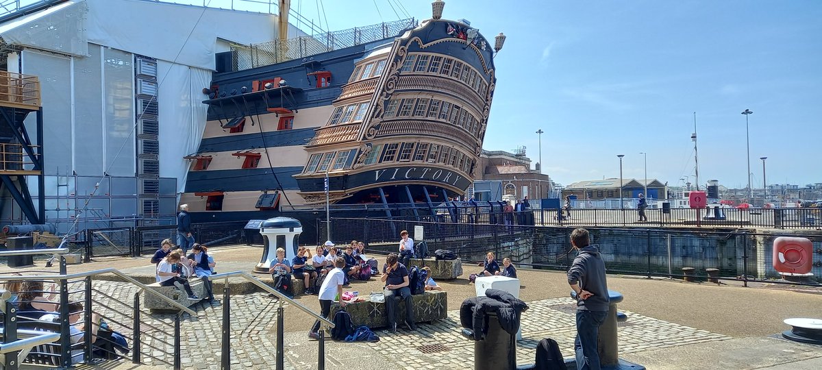 Y5 enjoying lunch in the sunshine at Postsmouth's Historic Dockyard