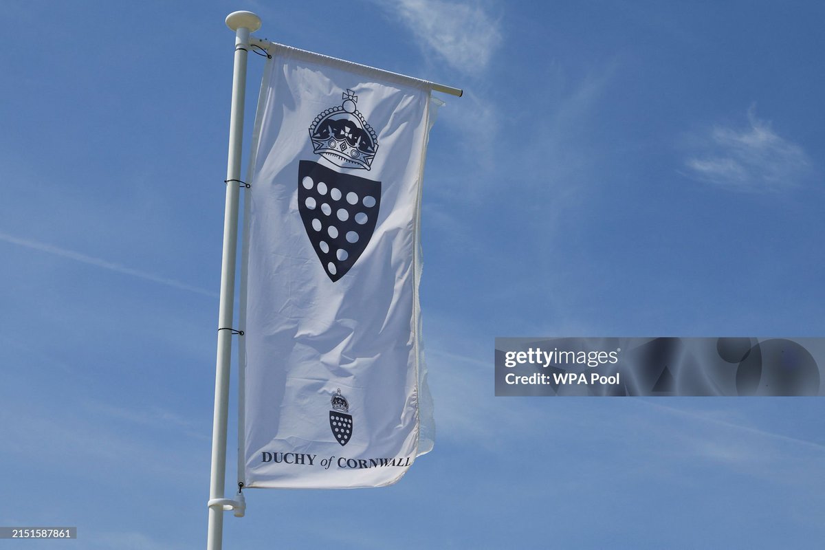A banner with the insignia of the Duchy of Cornwall flies on the day of a visit by Prince William to a Duchy of Cornwall housing project in Newquay.