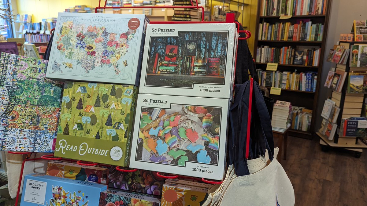 Our puzzles in the wild! 🥳🥳🥳 We are absolutely stoked to see #OhMICookies and #TheStoriesofJoshMalerman at #2DandelionsBookshop in Brighton, MI! #getsopuzzled #jigsawpuzzles #puzzler #puzzlelife #puzzlefun #michigander #michiganbusiness