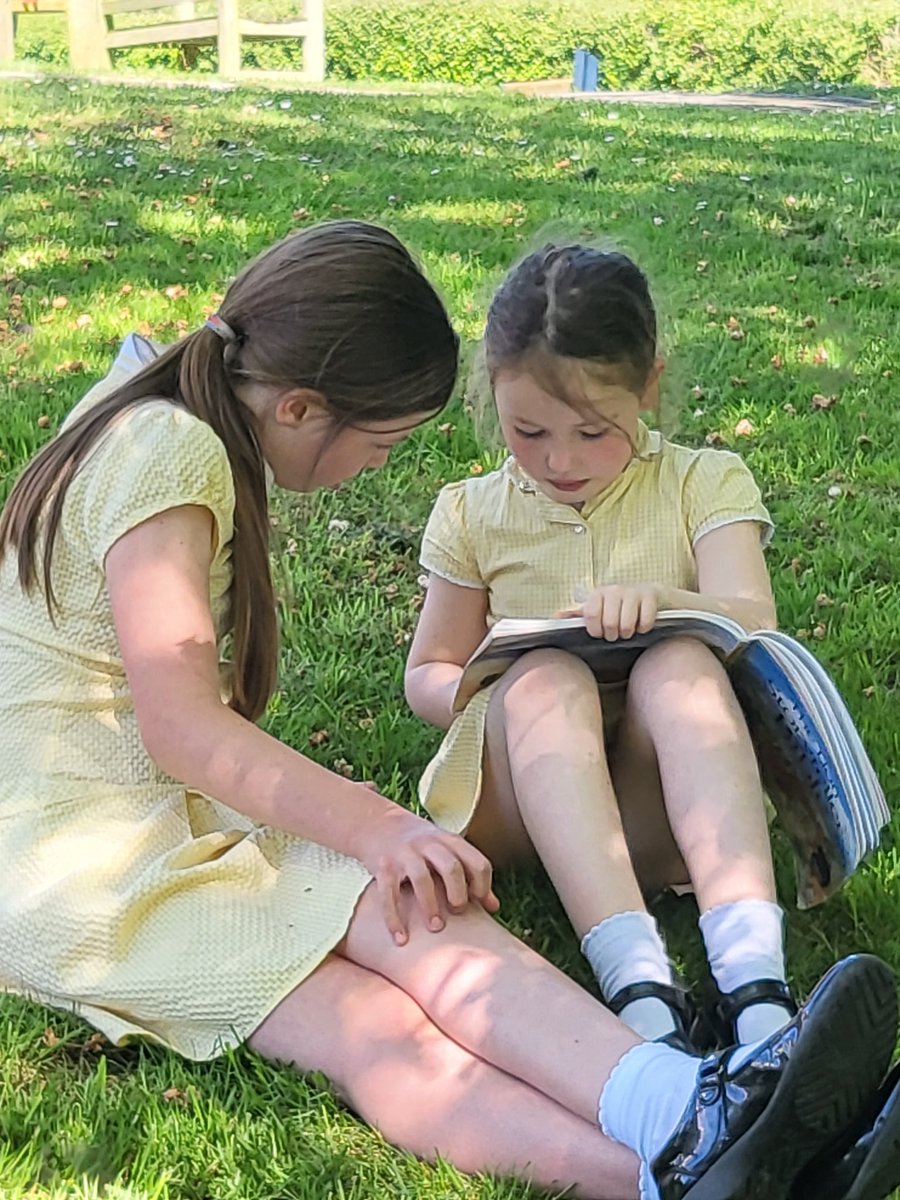 The first outdoor Book Friends of the year!  Enjoying sharing a book with our friends from across the school in today's glorious sunshine #readingforpleasure #friendship