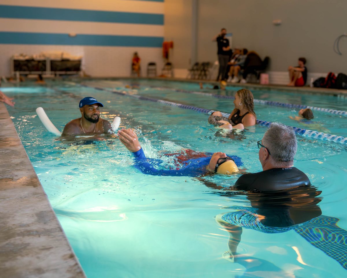 At our recent adaptive swim clinic with @IRONMANtri Foundation, youth from across Southern California gathered at @GoEoSFit Carlsbad w/head coaches Alan Vosard + Alison Terry. Everyone was really excited to learn about water safety and practice water skills! #TeamCAF #EoSFitness