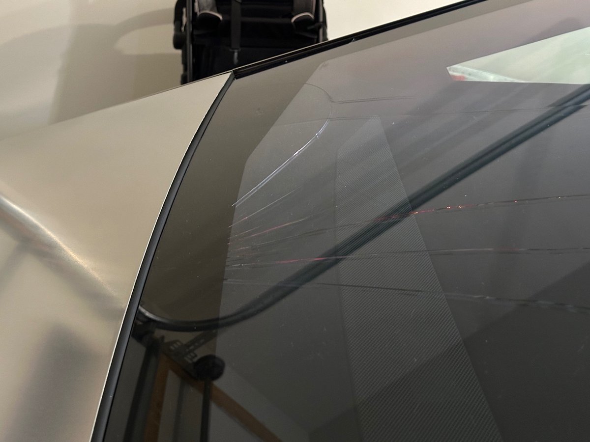 guy's Cybertruck windshield cracks on delivery day, he realizes it was set incorrectly, it continues to fracture day by day as he fights with the Tesla service center over repair timeline and costs. 'For now it's a glistening, $100K garage ornament' cybertruckownersclub.com/forum/threads/…