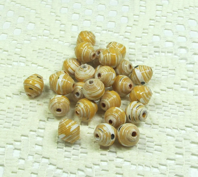 Paper Beads, Loose Handmade Jewelry Making Supplies Craft Supplies Round Bees and Daisies on Yellow etsy.me/3KewLpX via @Etsy 
#paperbeads #honeycoloredpaperbeads #handmadebeads #jewelrymakingbeads