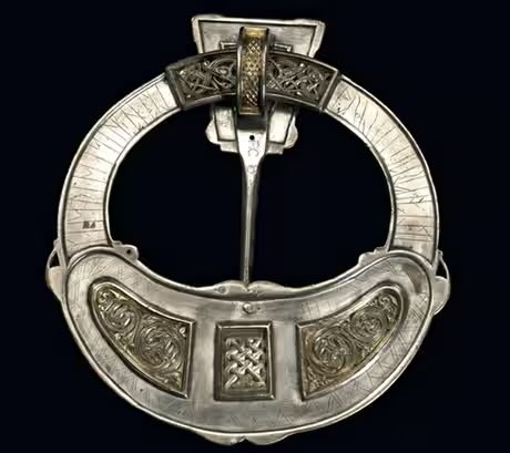 The Hunterston brooch found in Ayrshire, is a pre-Viking Scottish brooch with purely Celtic decoration. But on the back, someone has scratched in Norse runes: 'Mælbrigða owns this brooch.'