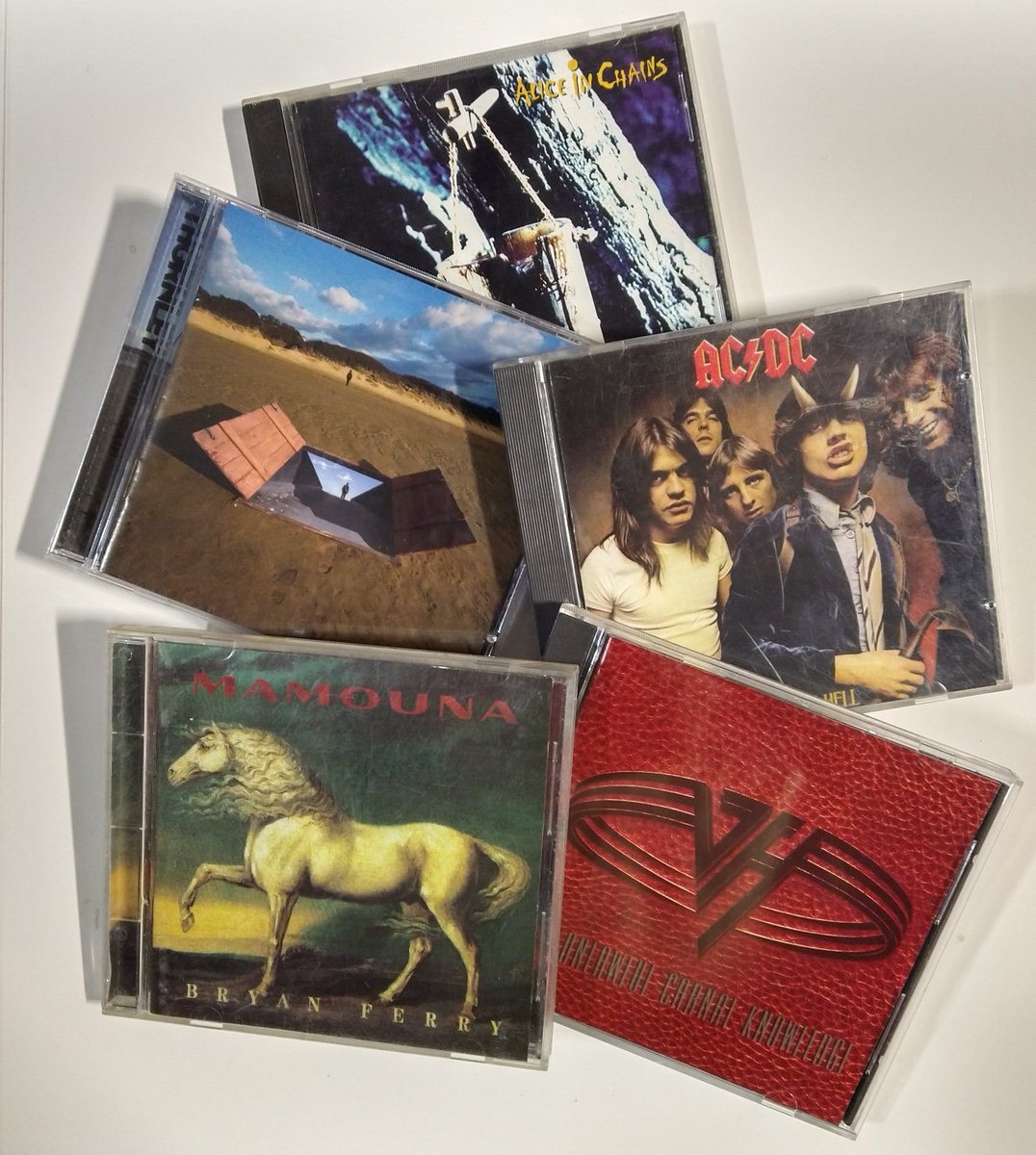 The automobiles musical choices have been replenished.  #AliceInChains #Thornley #ACDC #BryanFerry #VanHalen #CD #CompactDisc #Automotive #CarStereo #OnTheRoad