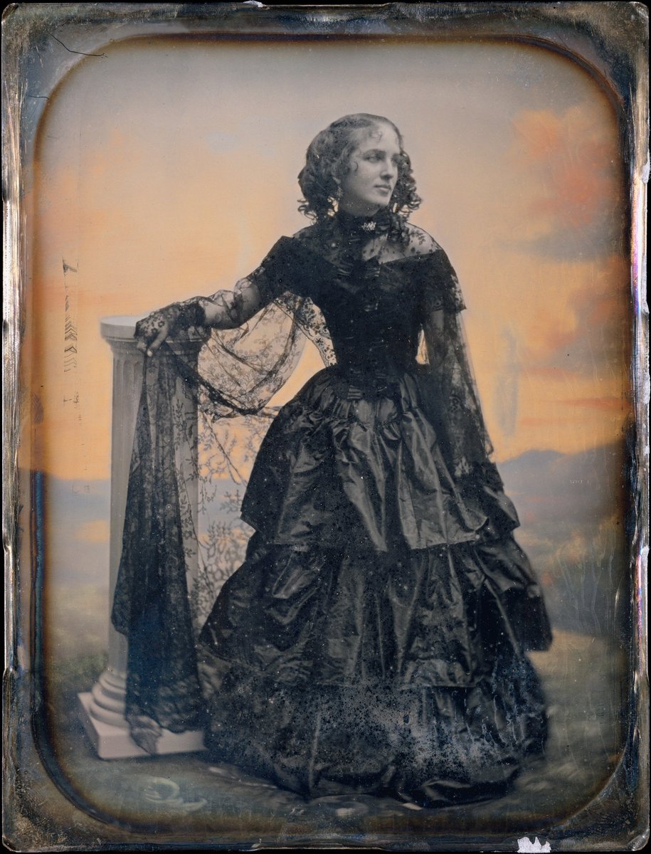Daguerrotype of an unidentified woman wearing a black taffeta dress and lace shawl. Photographed by Southworth and Hawes, 1850. The MET.