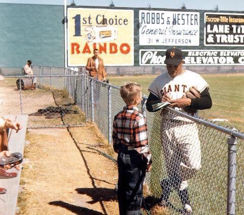 Willie Mays signing for a youngster during Spring training, 1955.