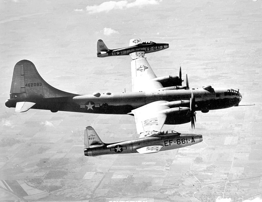 Project Tip-Tow was a Cold War experiment to allow bombers to tow their own jet fighter escorts into action. Jet fighter escorts lacked the range of bombers so were attached to the tip of bomber wings for long flights. The project didn't work out. #1950s