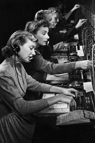 In the early days of telephony, companies used manual telephone switchboards, and switchboard operators connected calls by inserting a pair of phone plugs into the appropriate jacks.