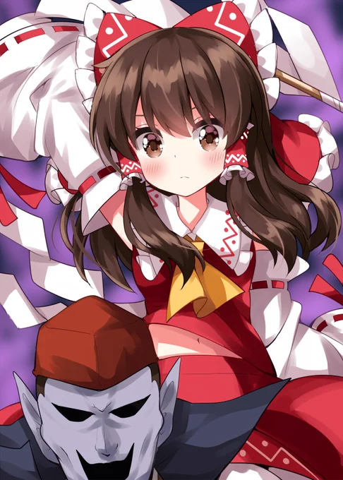 易者と背後からお祓い棒を振り下ろす霊夢