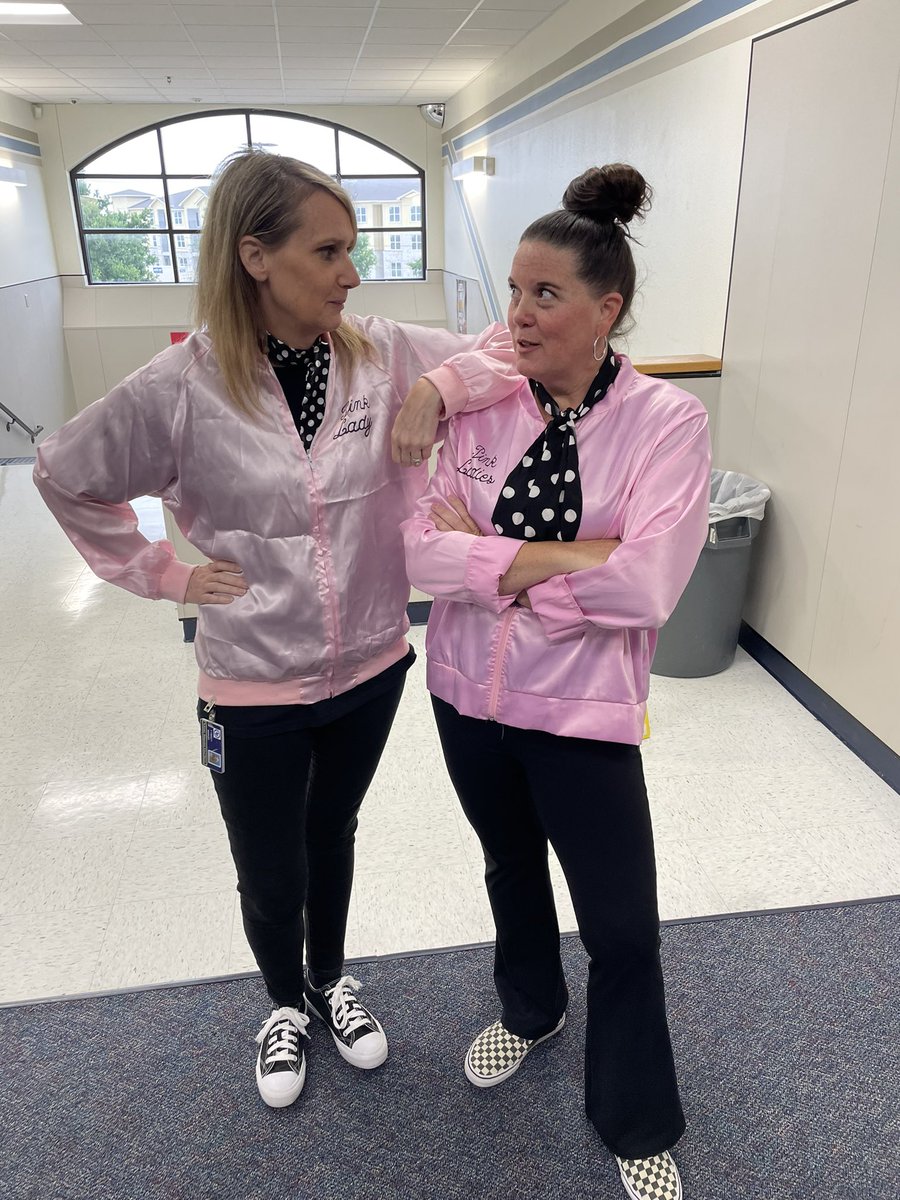 You know what time it is!! The Greaser Girls 👧🏻 👧🏼are back! #TheOutsiders @SJMSTigerPride @CBridgesELAR Stay Gold! 💛#PinkLadies of SJMS 7th grade