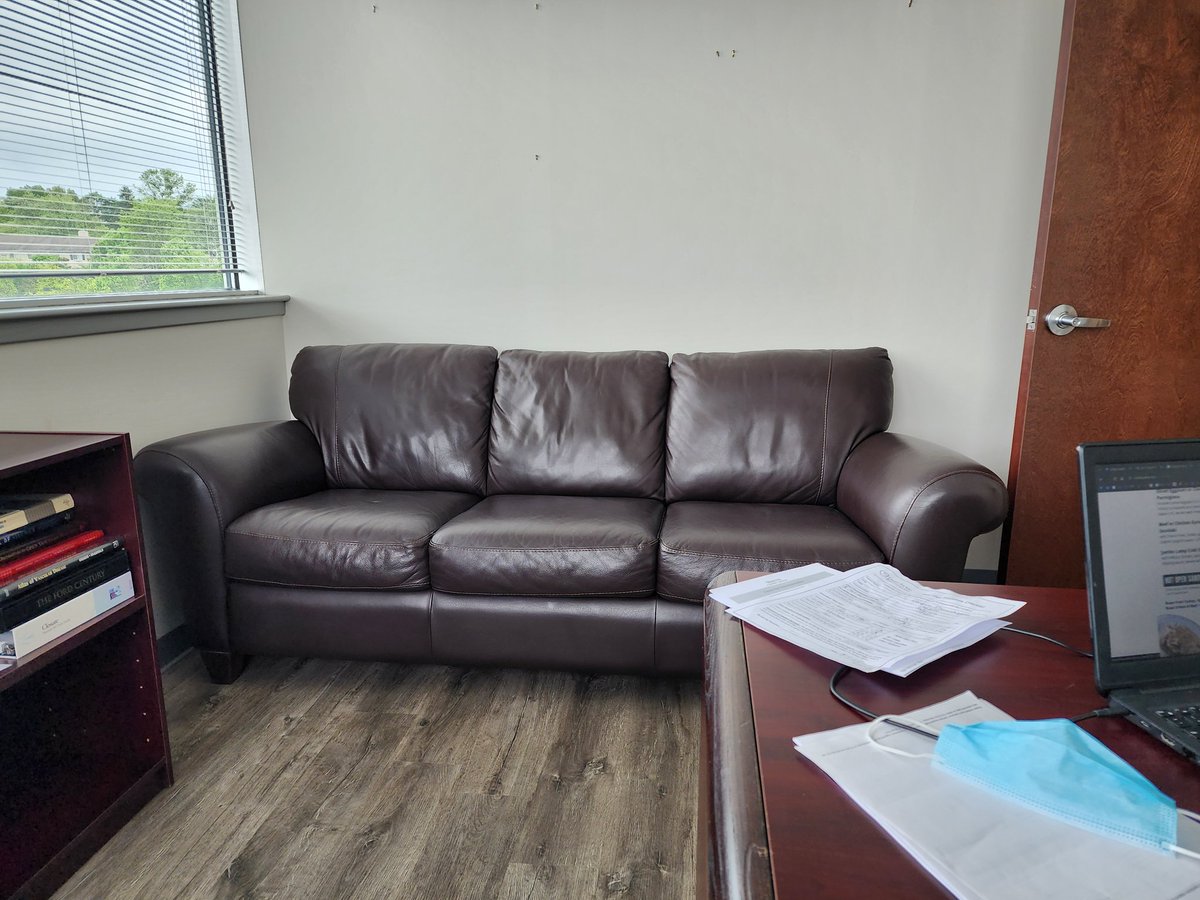 Natuzzi leather sofa in the office is a baller move.