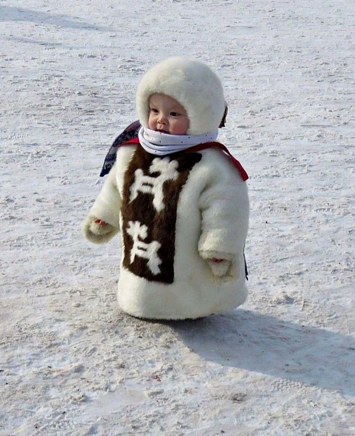 Kid in traditional winter dress
Siberia 🇷🇺