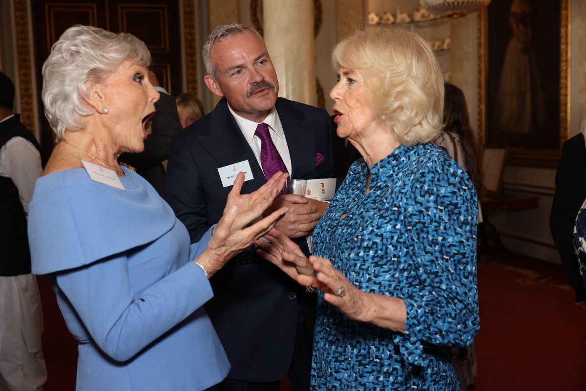 Queen Camilla speaks to Angela Rippon as she hosts a reception at Buckingham Palace in London, to mark the 90th anniversary of Brooke, a charity dedicated to improving the lives of working horses, donkeys, and mules. Image ID: 2X5EH2H / Geoff Pugh / PA Wire #queencamilla