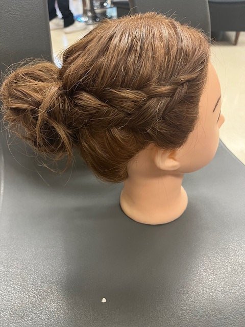 Laura V. completed this fabulous up do today in Ms Barbosa's Cosmetology class!!
