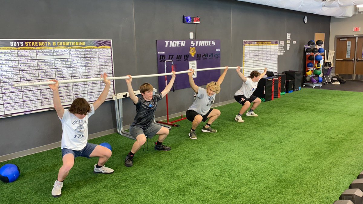 Improving our overhead squat was a group effort today. We decided that connecting our PVC pipes was the best way to go! #gotigers