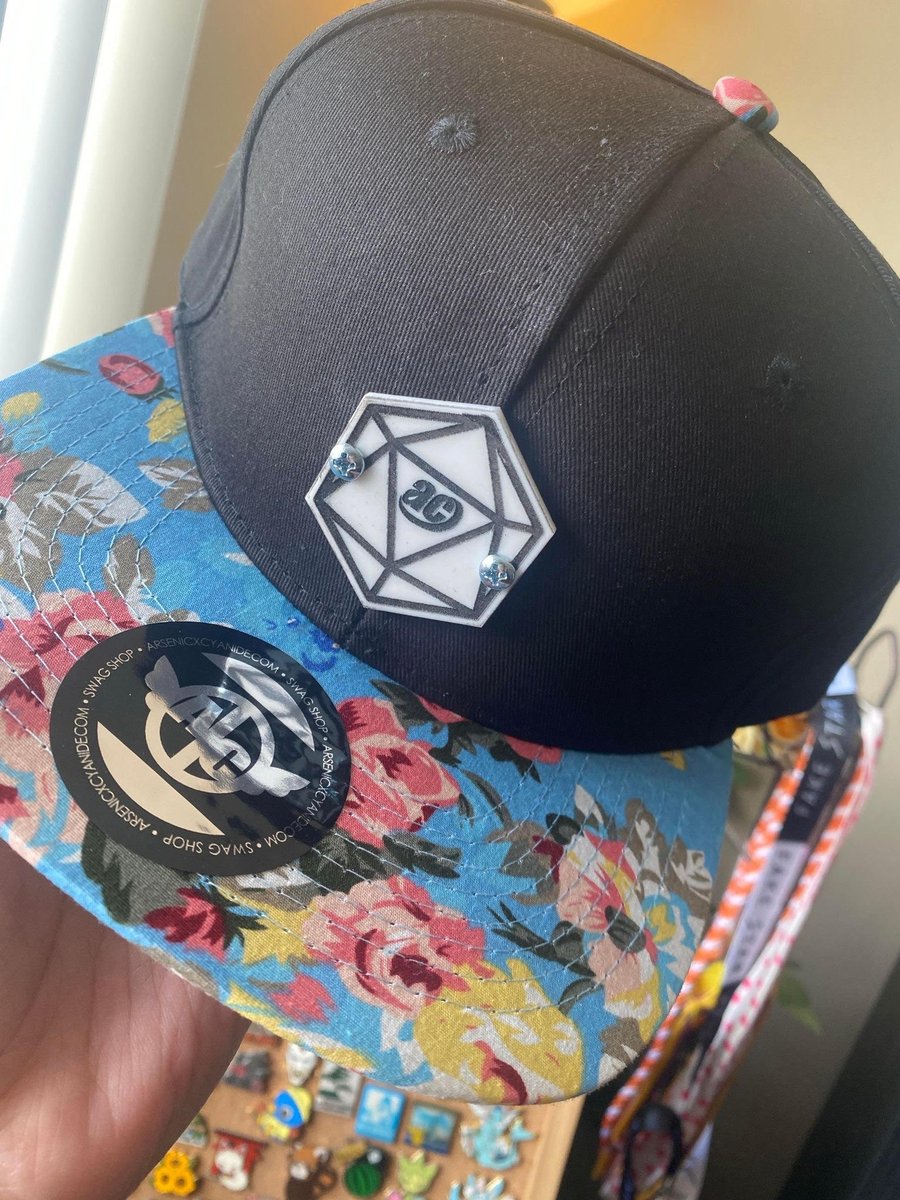 Who likes merch? We sure do! We are partnering with our good friends at @arsenic_cyanide to bring you this amazing ACen D20 hat! This will be located at our merch booth in Hall A and supplies will be limited so get them while you can!