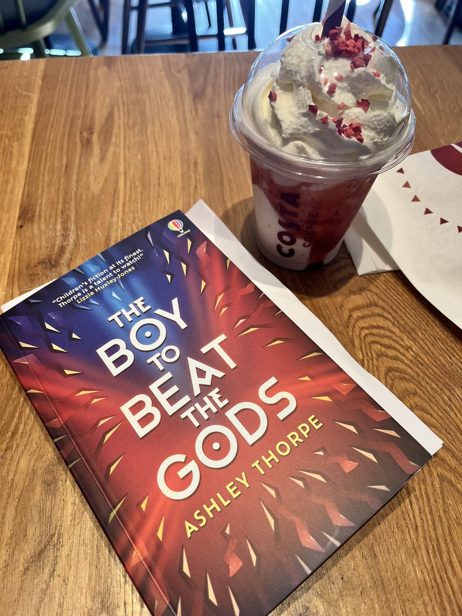 Daughter is off dancing & I’ve signed my headship contract for September so I’m celebrating with a @CostaCoffee frappe & reading The Boy To Beat The Gods @ashley__thorpe - I LOVE this book! 🤩📖☀️