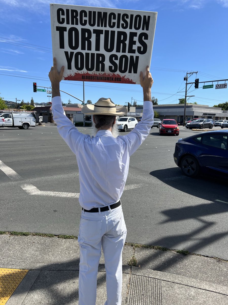 bloodstained men in Santa Rosa California, day two of the California circumcision crisis protests, May 9, 2024