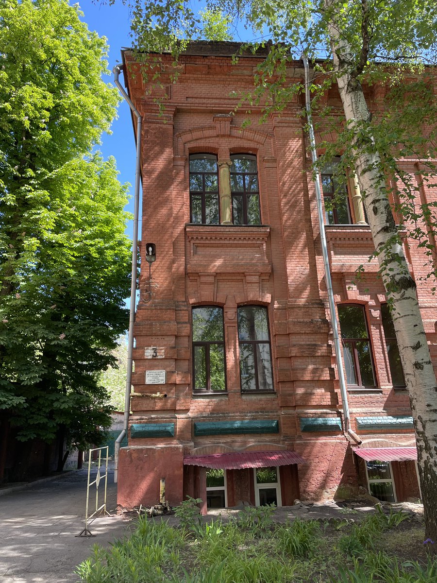 Kharkiv medical college, originally built in 1891 as an orphanage. The college itself dates back to the paramedic school founded in 1845 and was then based in Saburova Dacha, the first psychiatric facility, recently attacked by russian bomb. Trademark Kharkiv red brick preserved.