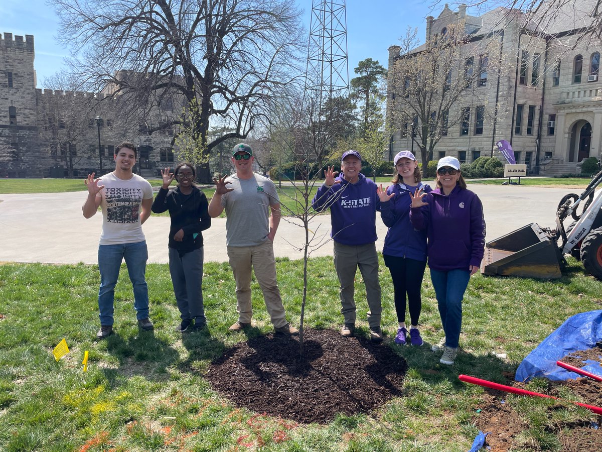 In April, K-State Campus Facilities celebrated a 'Day of Service.' NE Community Forester Blaine Stroble helped K-State President Linton plant a black pearl redbud in the McCain quad and shared information on tree care and maintenance with the volunteers and staff.