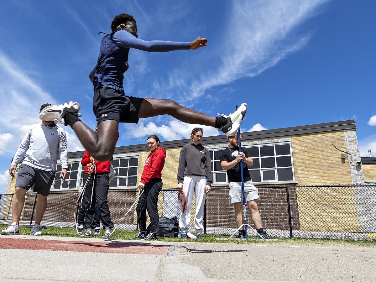 Michael Elah of @assumptionlion competes in the novice men’s long jump event Thursday at the @BHNAthletics track & field championships in #Brantford. Photo gallery here: brantfordexpositor.ca/sports/high-sc… @TheExpositor