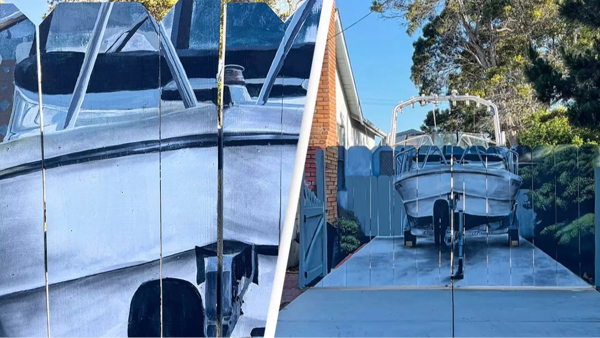 Homeowner was told to remove the eyesore that was his boat in the driveway, so he had a mural painted on a new fence. [🖌️ Hanif Wondir] [📍 Seaside, California]