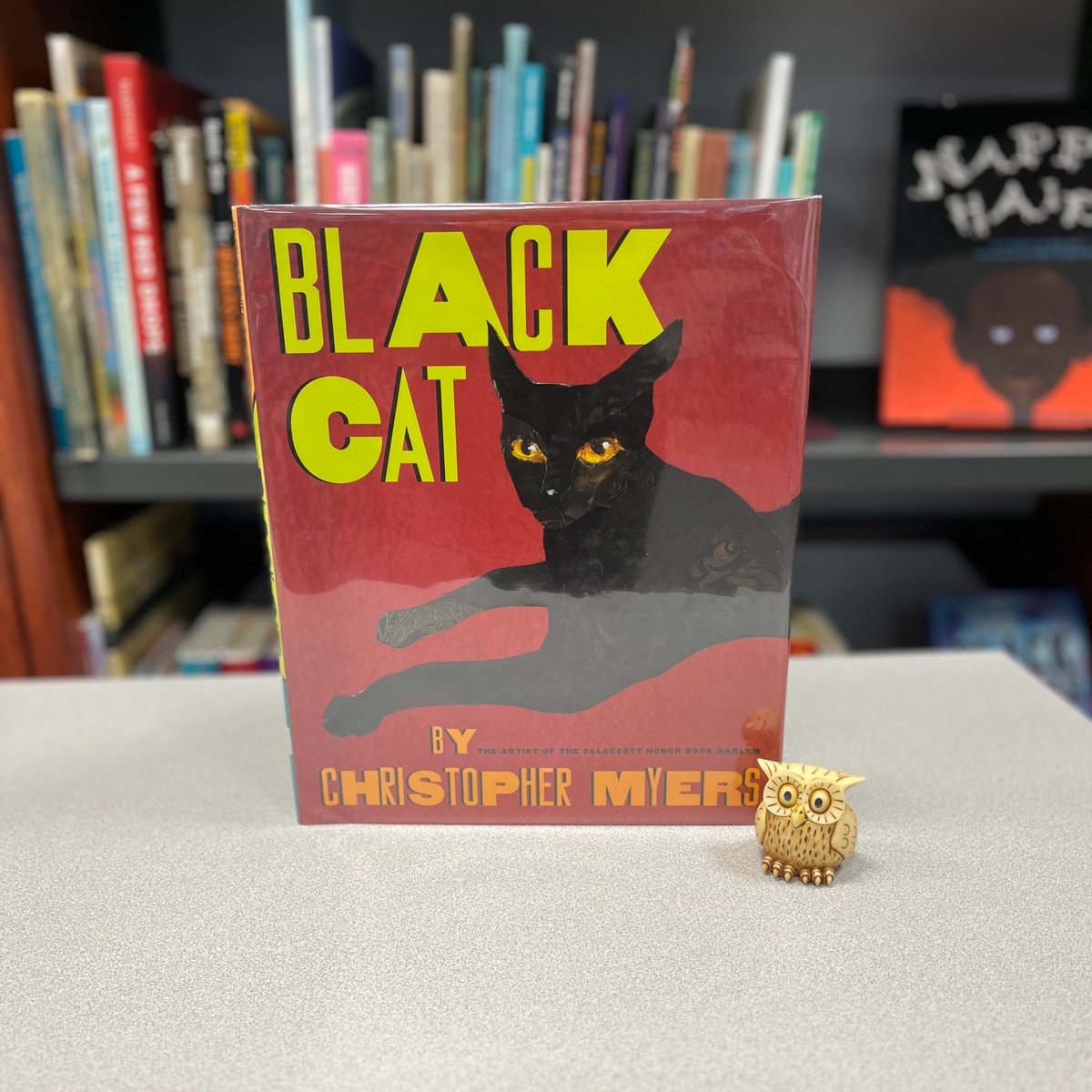 Black Cat written and illustrated by Christopher Myers. A black cat travels through a city looking for a home, accompanied by rhythmic text and collage artwork. #butlermidweekmorris #ChristopherMyers @Scholastic