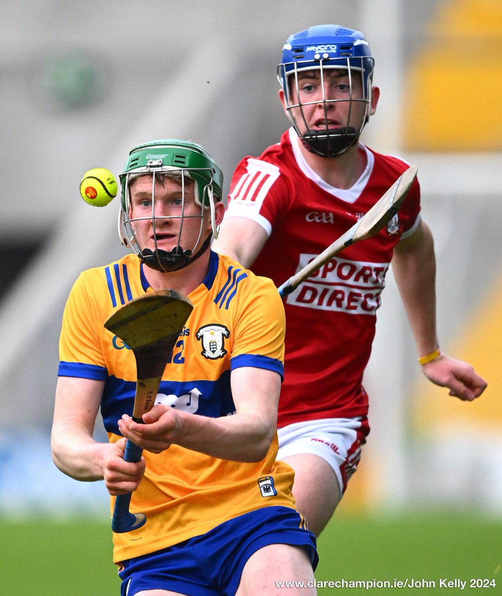 Harry Doherty of Clare in action against Kevin Beechinor of Cork during their Munster Minor Hurling Championship game at Pairc Ui Chaoimh. Photograph by John Kelly. The score after the third quarter is @GaaClare 1-15 , @OfficialCorkGAA 0-15 @MunsterGAA #GAA
